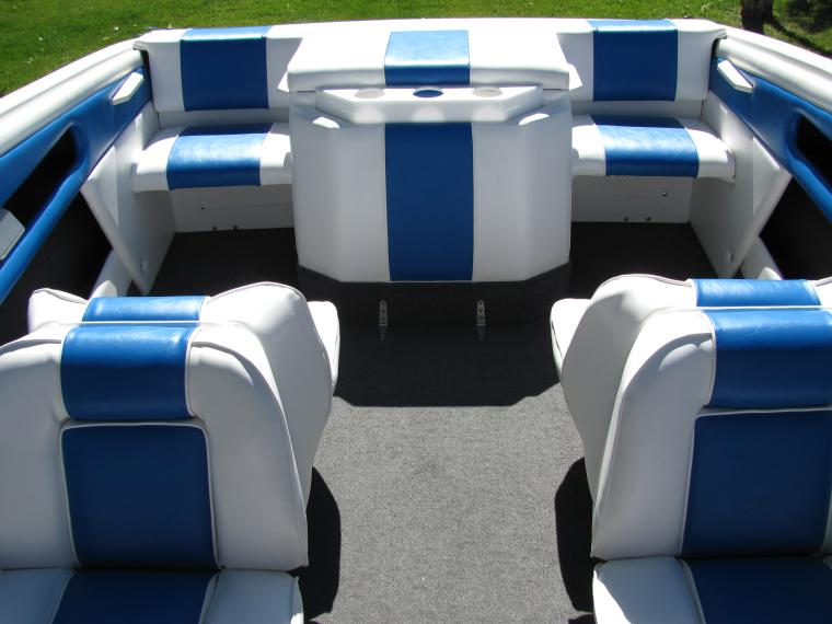 Rinker boat seating reupholstered in blue-and-white marine vinyl